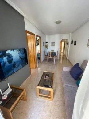Mooi appartement met zwembad 750m van het strand